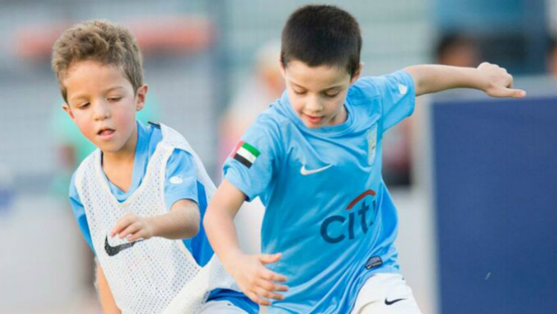 Children take part in a City Football Schools Abu Dhabi training session