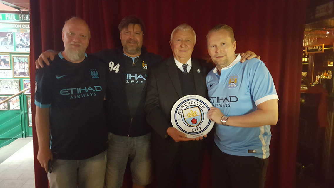 RECOGNITION: Mike Summerbee presents the Swedish Supporter Club with their commemorative plaque.