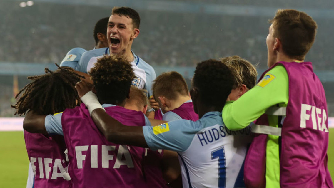 TOP OF THE WORL: Phil Foden (top) celebrates