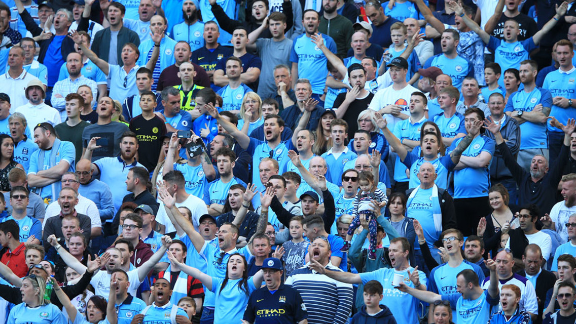BLUE MOON: Fans belt out a rendition of the famous City song