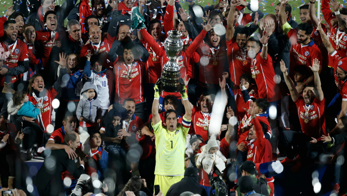 ON TOP OF THE WORLD: Claudio Bravo was the first Chilean to lift the Copa America.