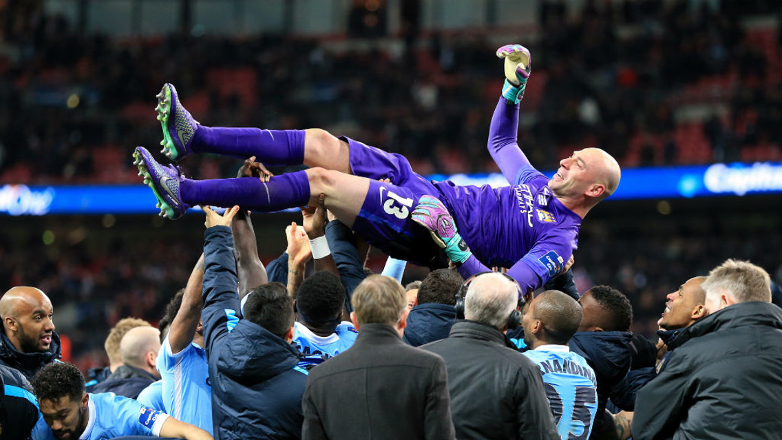 FLYING HIGH: Willy's team-mates show their appreciation.