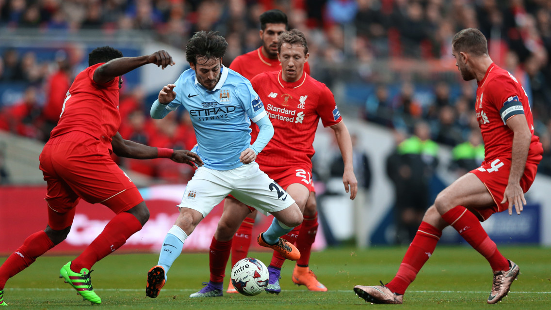 CATCH ME IF YOU CAN: Silva tries to wiggle away from four Liverpool players at Wembley
