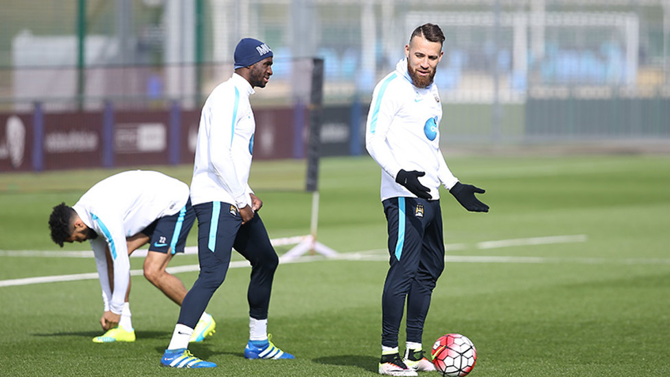 DEFENSIVE UNIT: Otamendi and Mangala share a joke