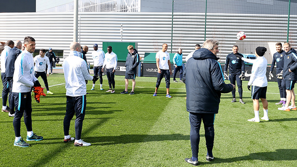 TEAM MEETING: Time for a game of keepie-ups before the boss delivers his instructions