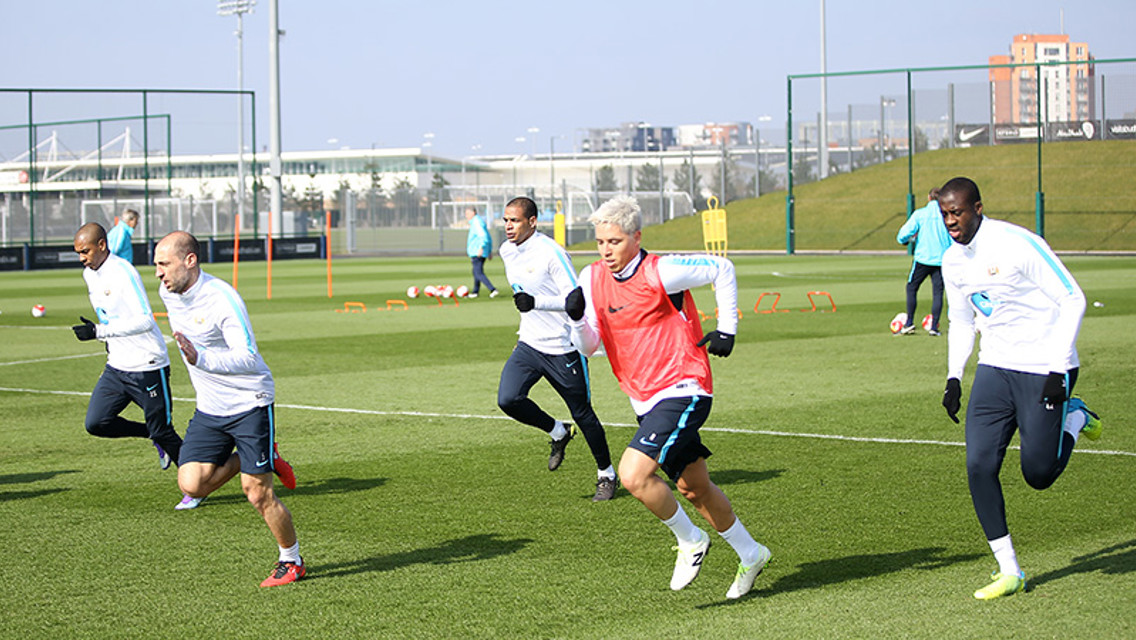 FRIENDS REUNITED: Samir joins his good friend Yaya Toure in a sprint.