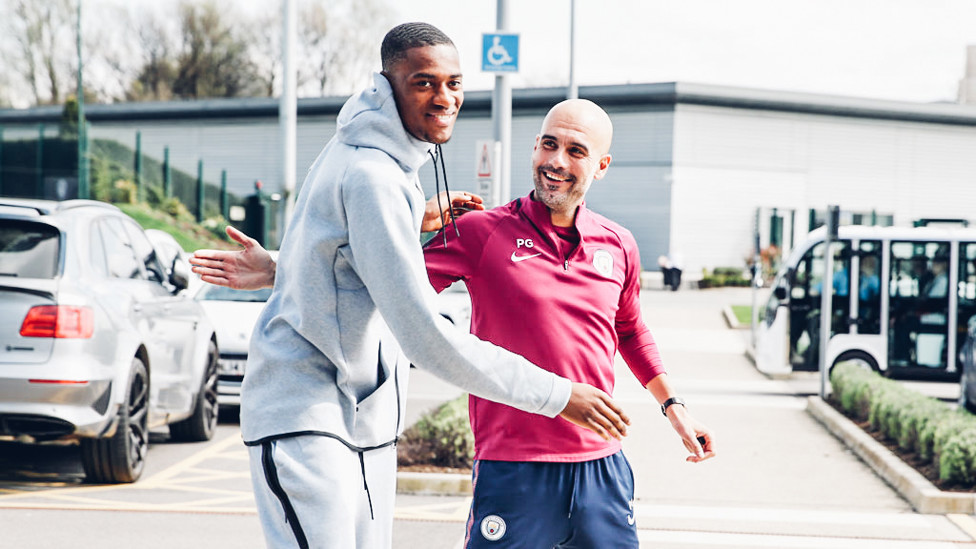 BLUE BOY: Tosin gets a hug from the boss.