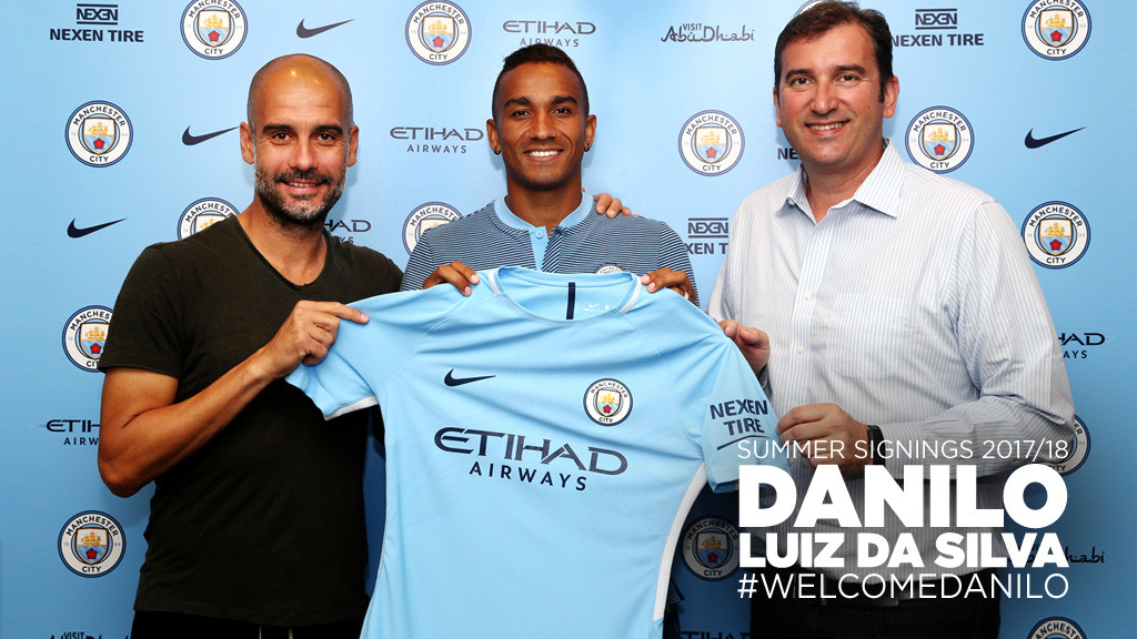 DEAL ME IN: Boss Pep Guardiola, Danilo and Chief Executive Ferran Soriano