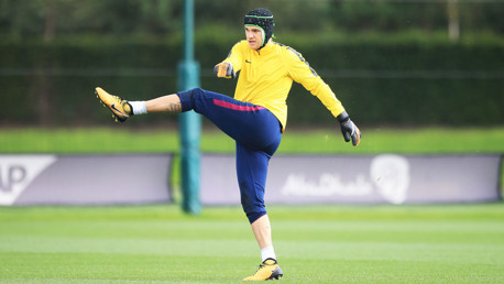 HE'S BACK! Brazilian goalkeeper Ederson, wearing protective head gear after Saturday's injury scare