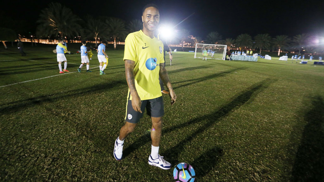 CAMERA GLANCE: Raheem Sterling poses for a photo as the session gets going