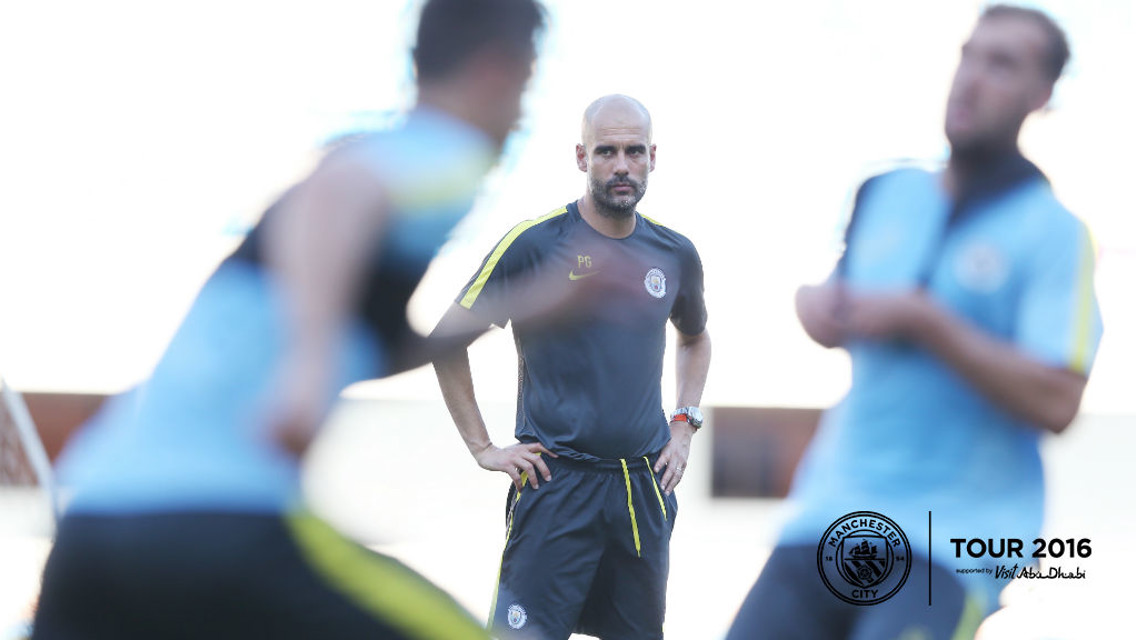 EL SENOR: Pep keeps watch over the youngsters in Shenzhen.