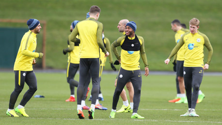 LAUGHING: No doubt John's equally as amused as Raheem.