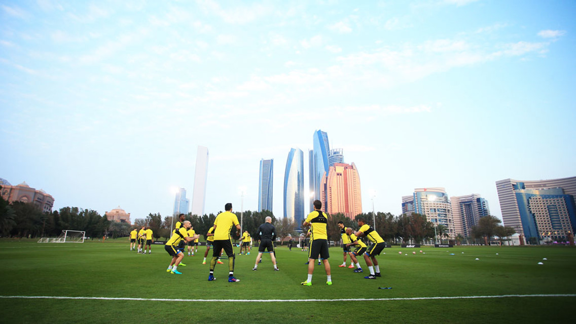 DOWN BELOW: Ground shot as the players stretch in Abu Dhabi.