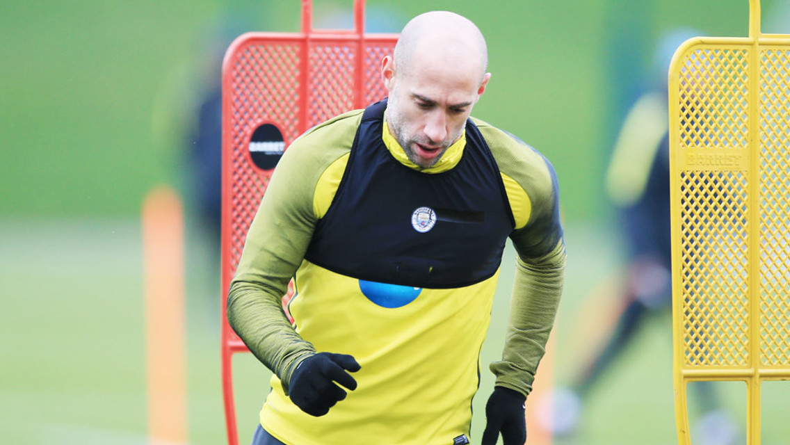 HEAD DOWN: Pablo Zabaleta zigs in and out of the barriers.