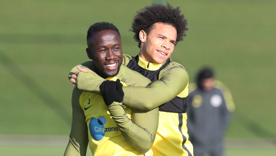 HUG IT OUT: Bacary Sagna and Leroy Sane