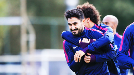 GOTCHA: Leroy Sane gives his compatriot Ilkay Gundogan a hug