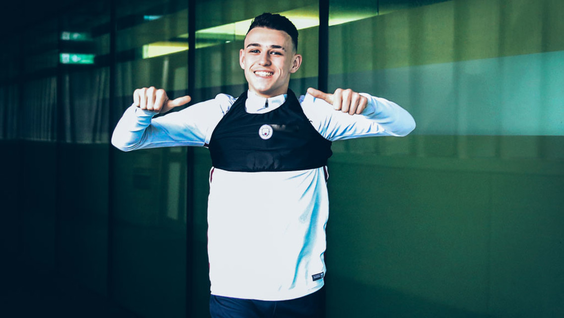 THUMBS UP: Phil Foden is all smiles ahead of training.