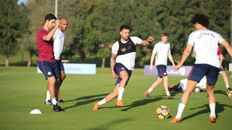 KEEP BALL: Mikel Arteta gets involved.