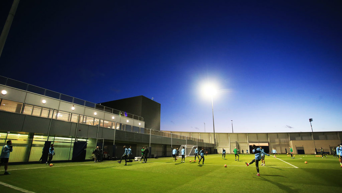 FLOODLIGHTS: The team train as darkness descends on Manchester