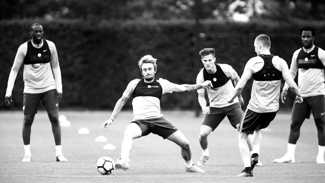 REACH: Aleix Garcia stretches for the ball