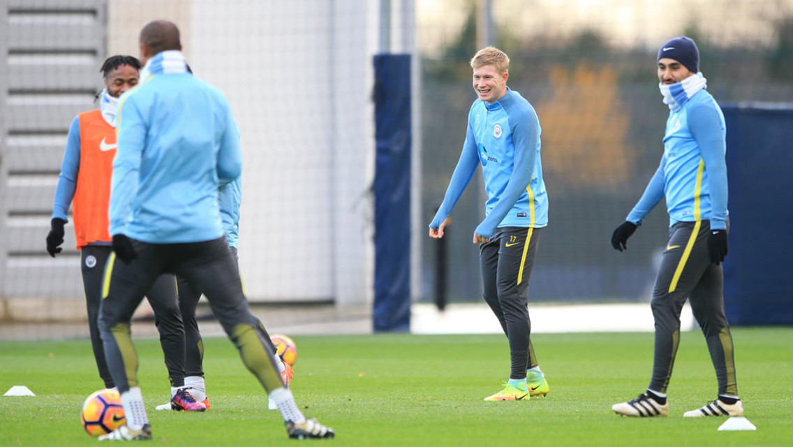 TICKLE MY SIDES: De Bruyne and Sterling share a funny moment
