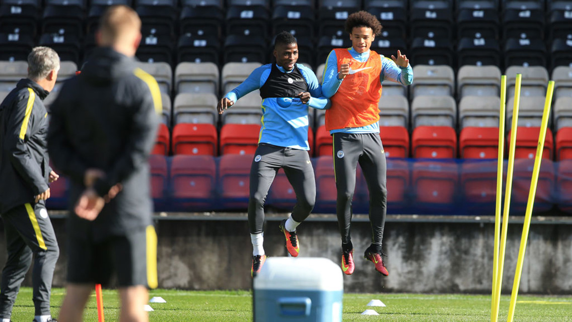 UP WE GO: Kelechi Iheanacho and Leroy Sane get some air time