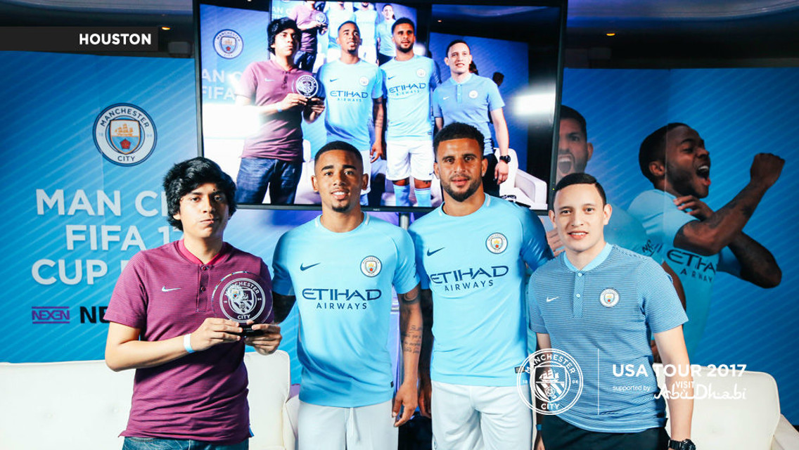 TEAM-MATES: Kyle and Gabriel with the PlayStation and Xbox winners of the Man City FIFA 17 Cup.