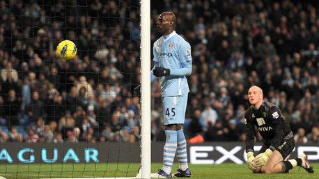 SHOULDER: Mario Balotelli scores with his shoulder