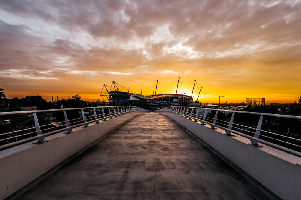 HOME: A beautiful sunset shot of the Etihad.