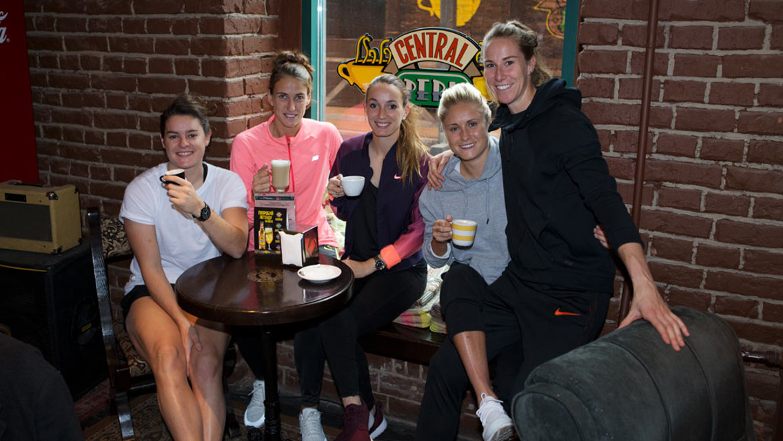 CHEERS: The team show off their coffees