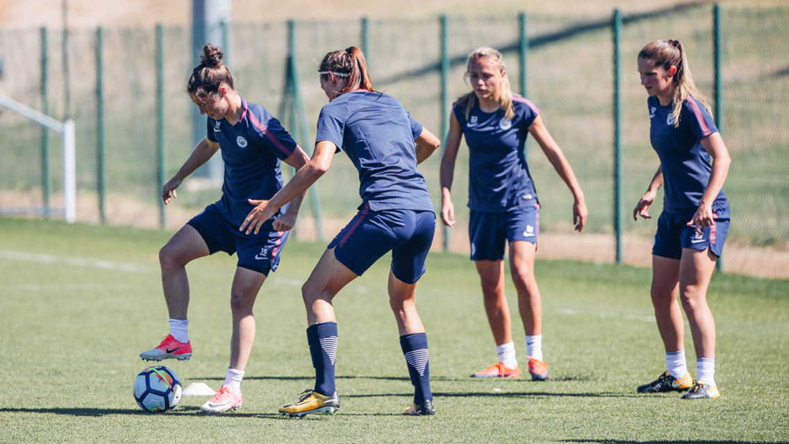 KEEP BALL: Jane Ross plots her next move, under the watchful eyes of Jill Scott, Claire Emslie and Abbie McManus