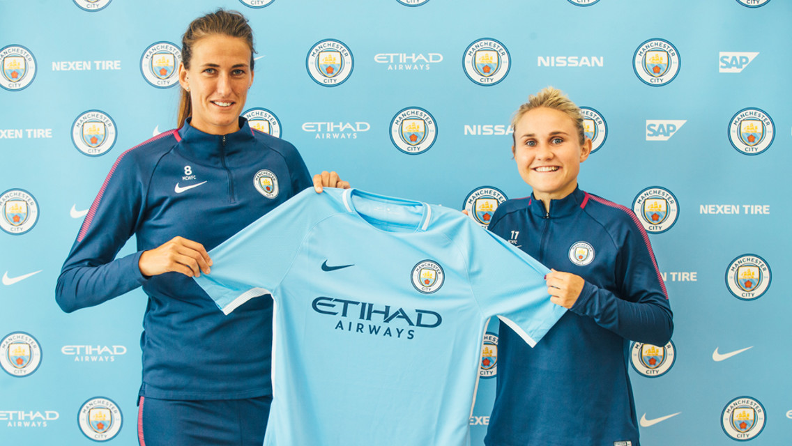 BLUE DUO: Lionesses Jill and Izzy hold the sky blue shirt aloft with pride