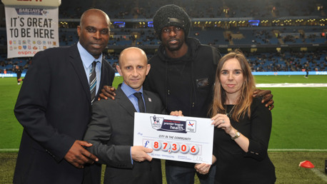 Alex Williams Adebayor cheque
