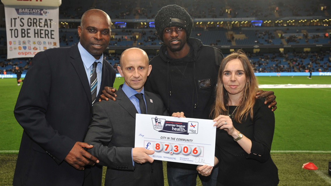 Alex Williams Adebayor cheque