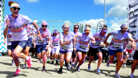 All smiles, the team sprint over the start line