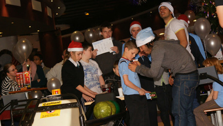 Squad strike festive chord with local kids