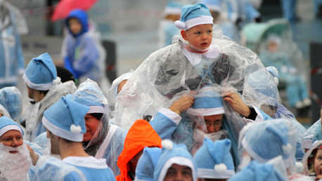Santas in the rain