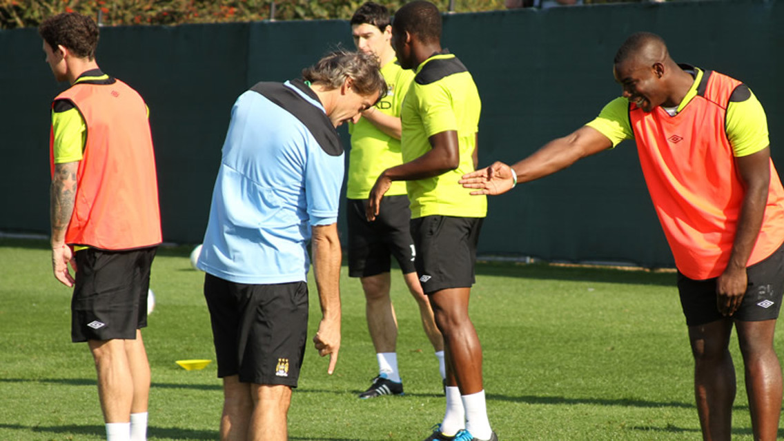 Micah Richards and Roberto Mancini
