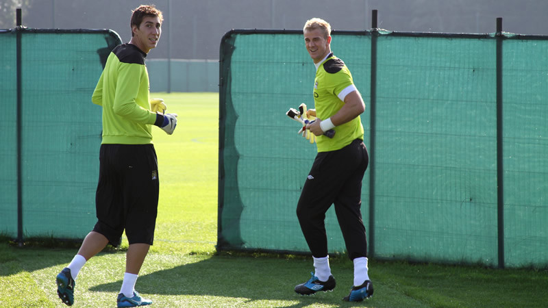 Joe and costel running out laughing to training