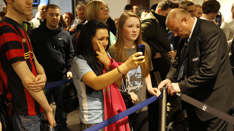 Crying girls at signing ession