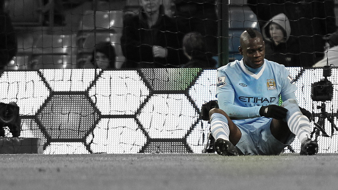 A missed chance is shrugged off but Mario's more concerned about the whether his socks look the part or not.