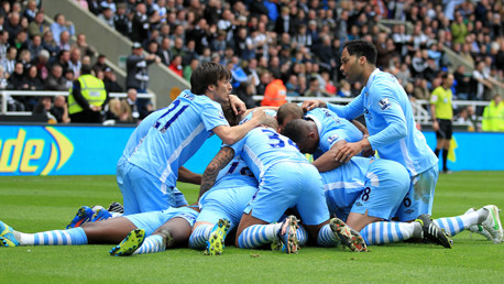 David Silva advises on first aid for an overwhelmed Yaya Toure.