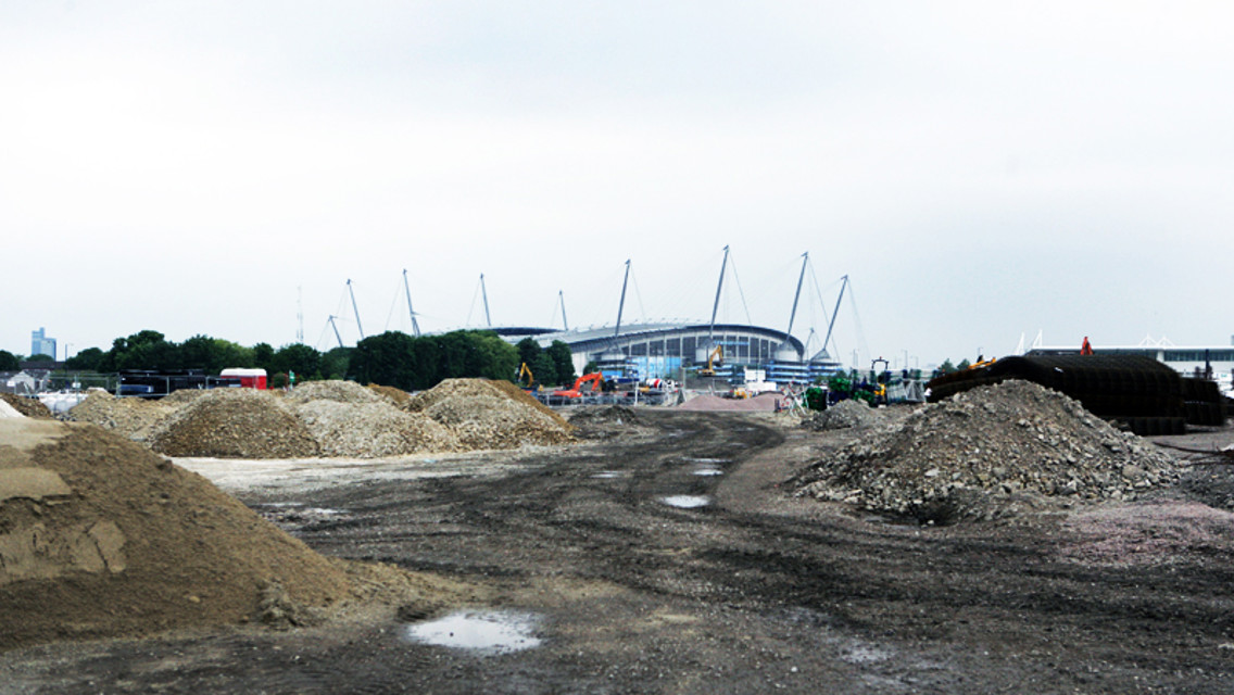  The Etihad Stadium towers above the building site