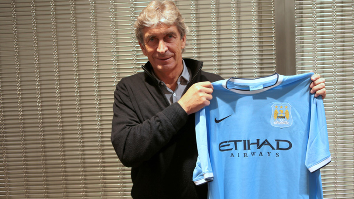 Pellegrini poses with the new City shirt - welcome, Manuel!