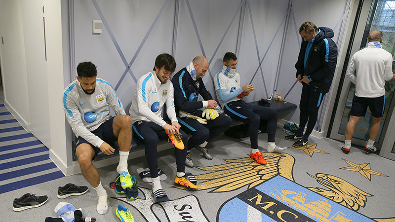 Manchester City players in the bootroom