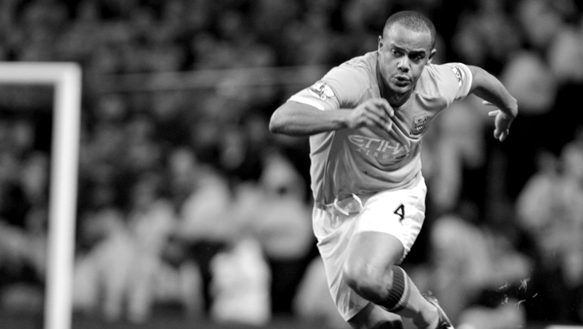 Kompany black and white