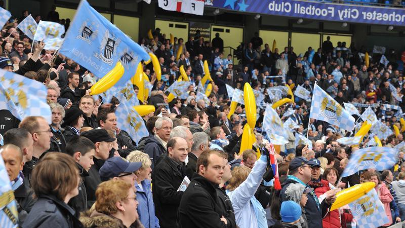 Crowd waving flags and bananas at Man City vs Hamburg at City of Manchester Stadium 0809