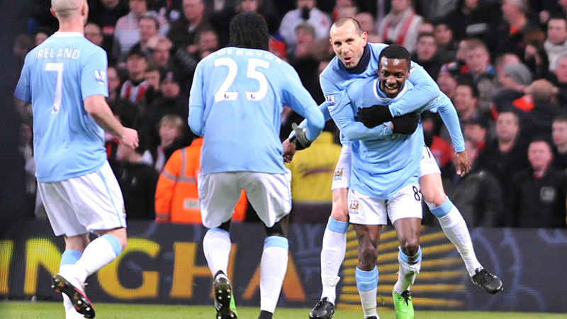SWP celebrates his goal with team mates