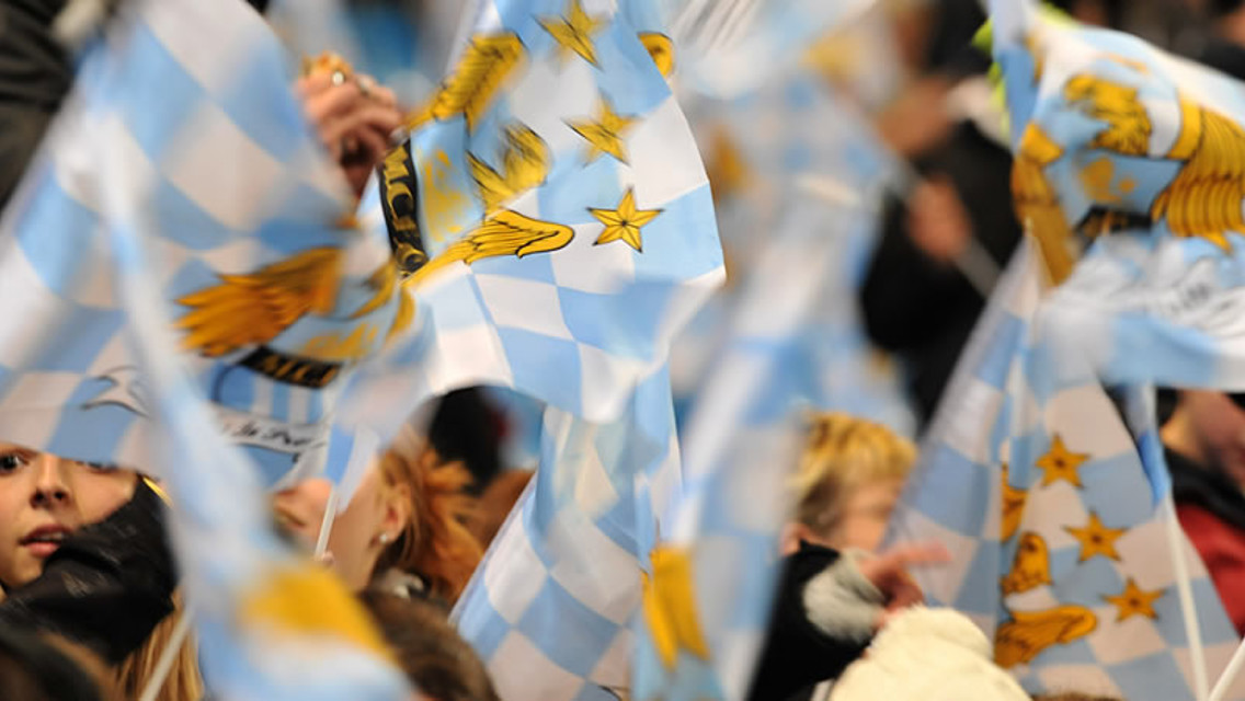 Fans fly the City flag