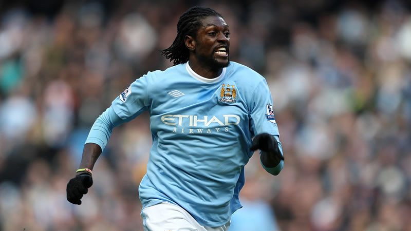 Emmanuel Adebayor celebrates scoring the first goal